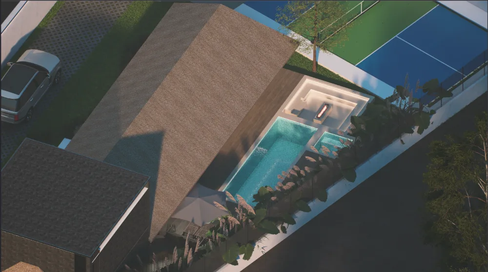 Aerial view over the villa roofline, pool deck and plunge pool