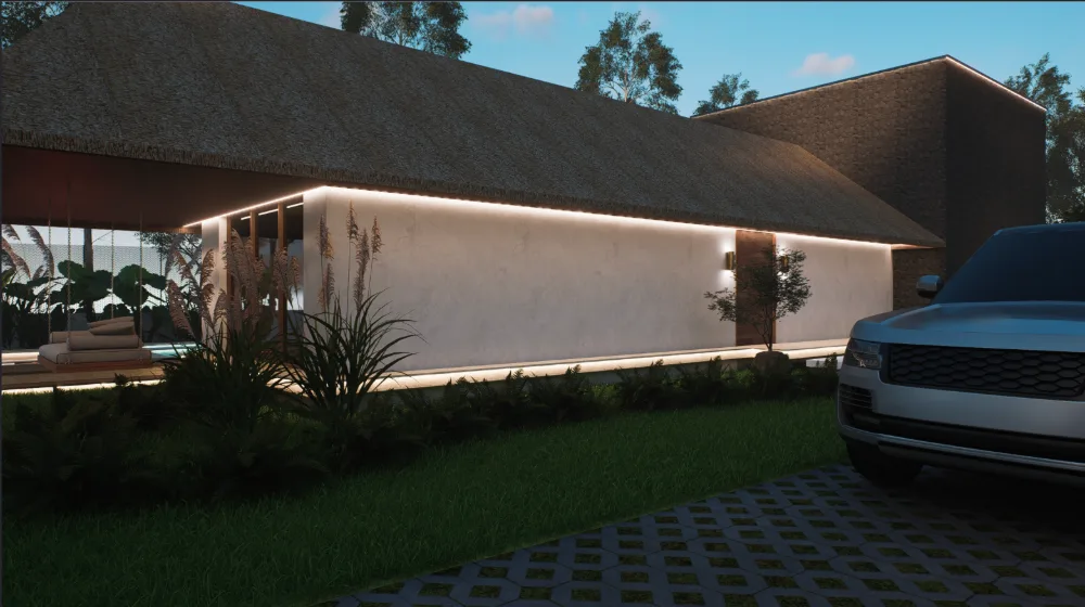 Villa exterior at dusk, cove lighting tracing the thatched roofline