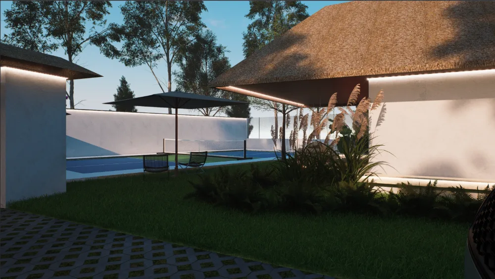 Thatched pavilion opening onto the lawn and swimming pool