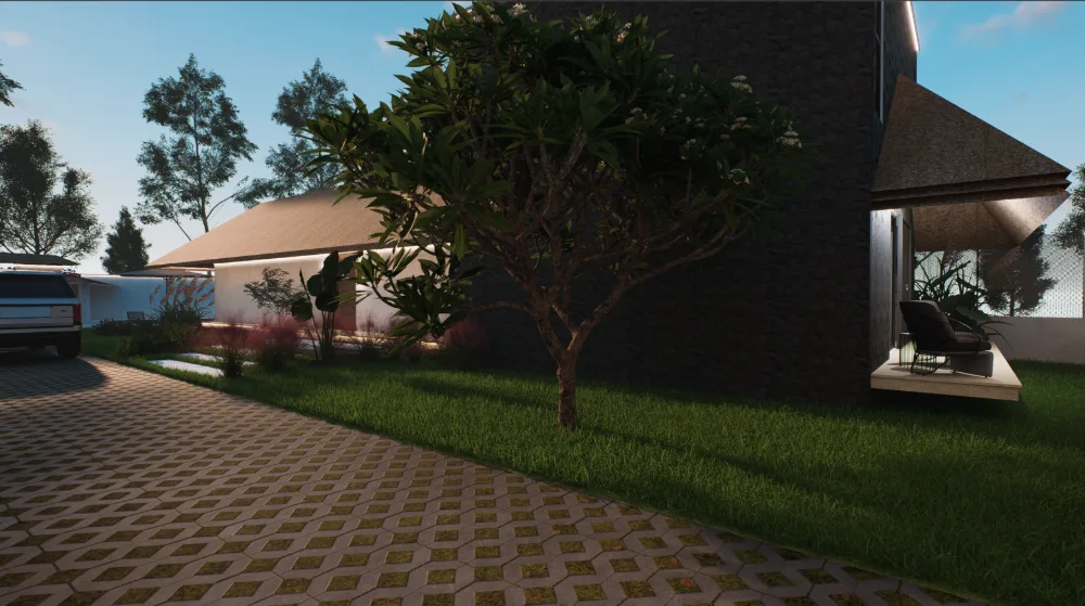 Frangipani-shaded lawn running alongside the villa